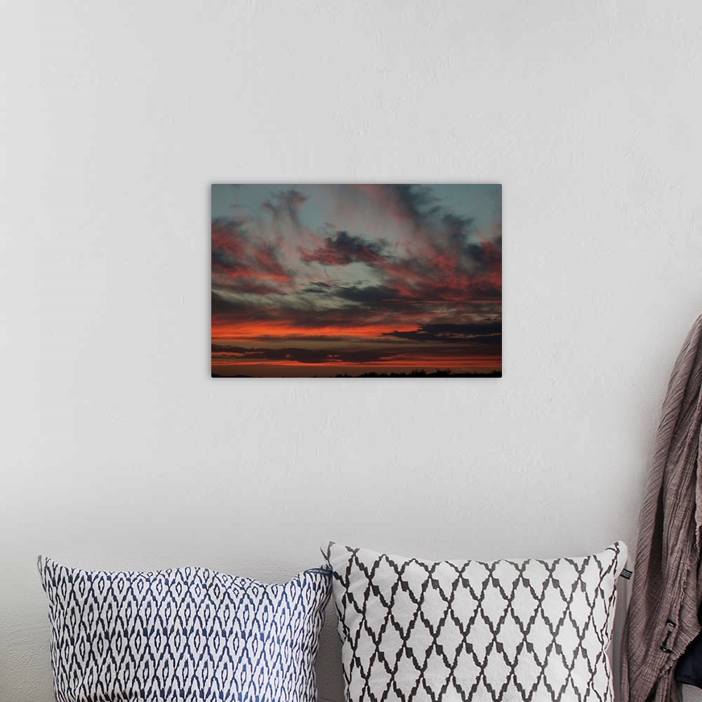 A bohemian room featuring Cloudy Sunset II