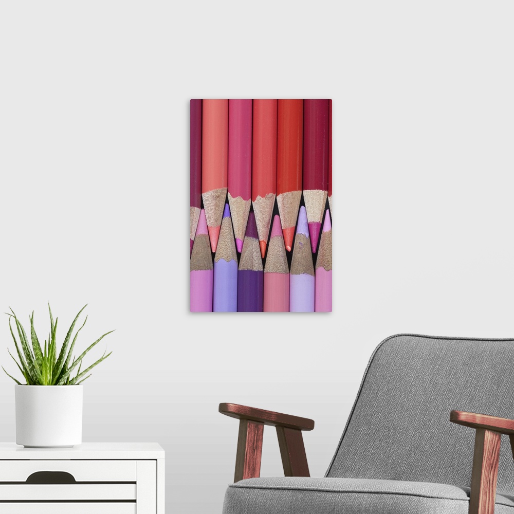 A modern room featuring Colored Pencils - shades of reds, purples and pinks