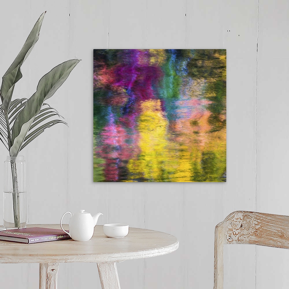 A farmhouse room featuring Reflections of a colorful forest in rippling water, creating an abstract image.