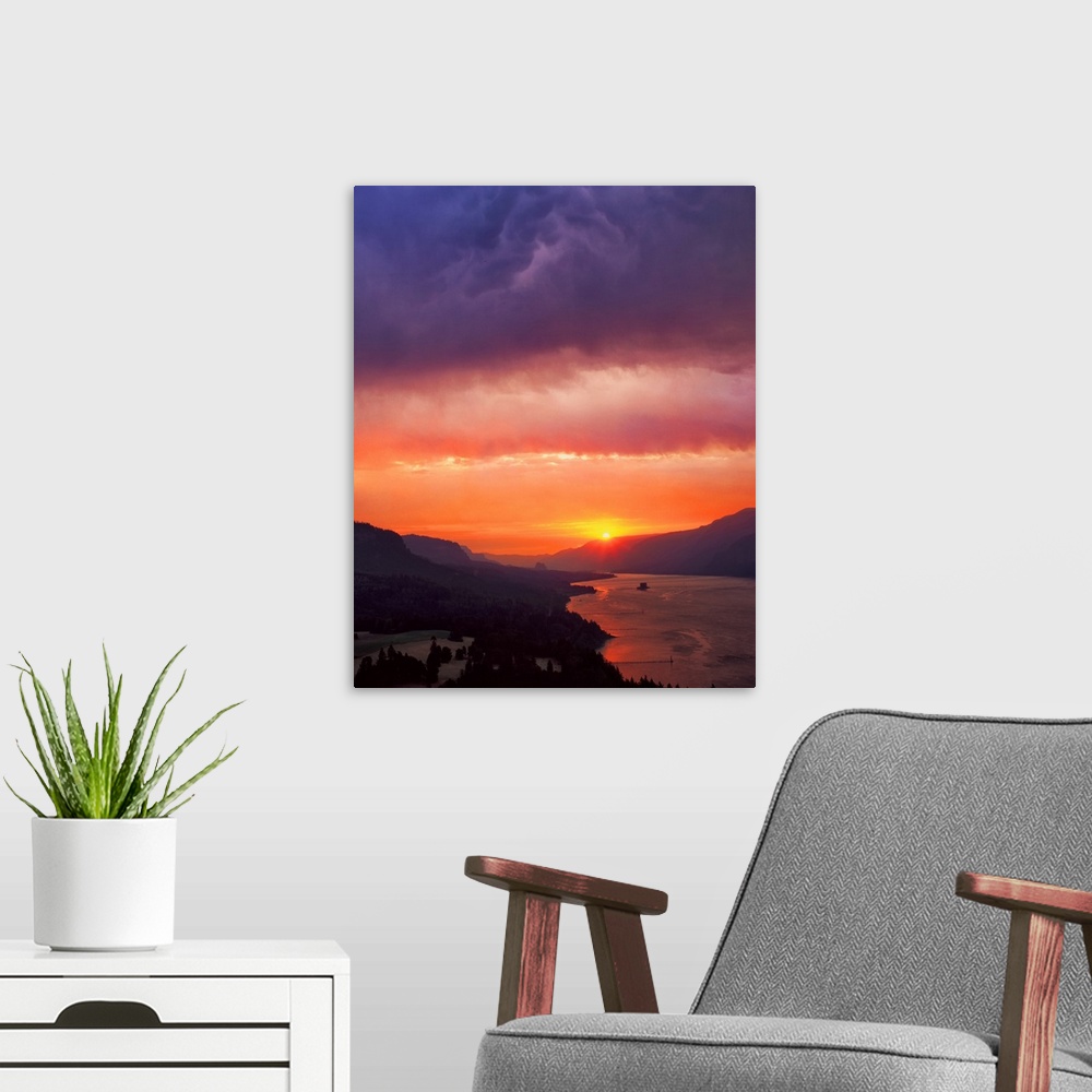 A modern room featuring Fiery sunset with a cloudy sky over the Columbia River Gorge.