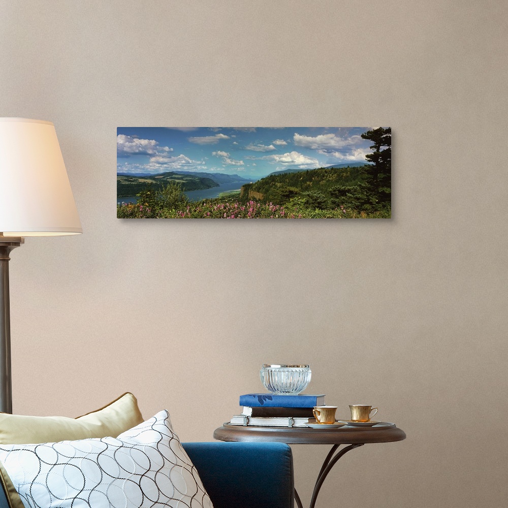 A traditional room featuring A bright blue sky with clouds over the Columbia River Gorge.
