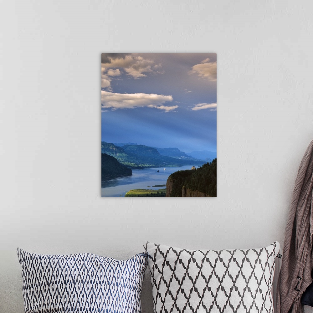 A bohemian room featuring A bright blue sky with clouds over the Columbia River Gorge.