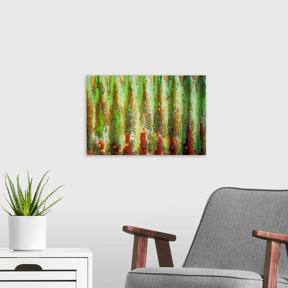 A modern room featuring Close up of rusty green corrugated metal, creating an abstract image.