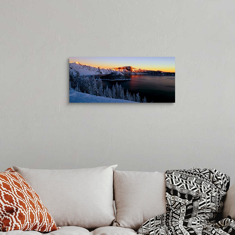 A bohemian room featuring Sunset over Crater Lake in Oregon in the winter.