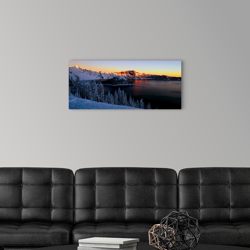 A modern room featuring Sunset over Crater Lake in Oregon in the winter.