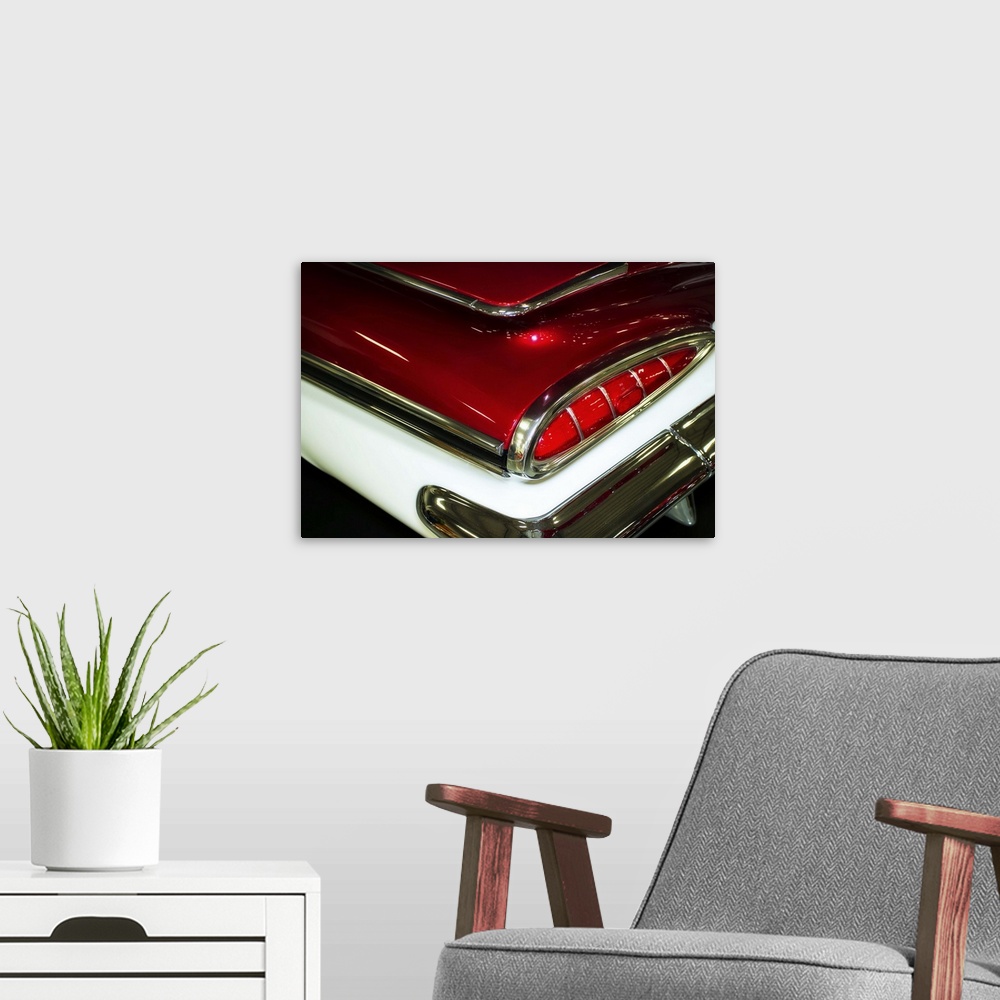 A modern room featuring Fine art photograph of the taillight of a vintage car.