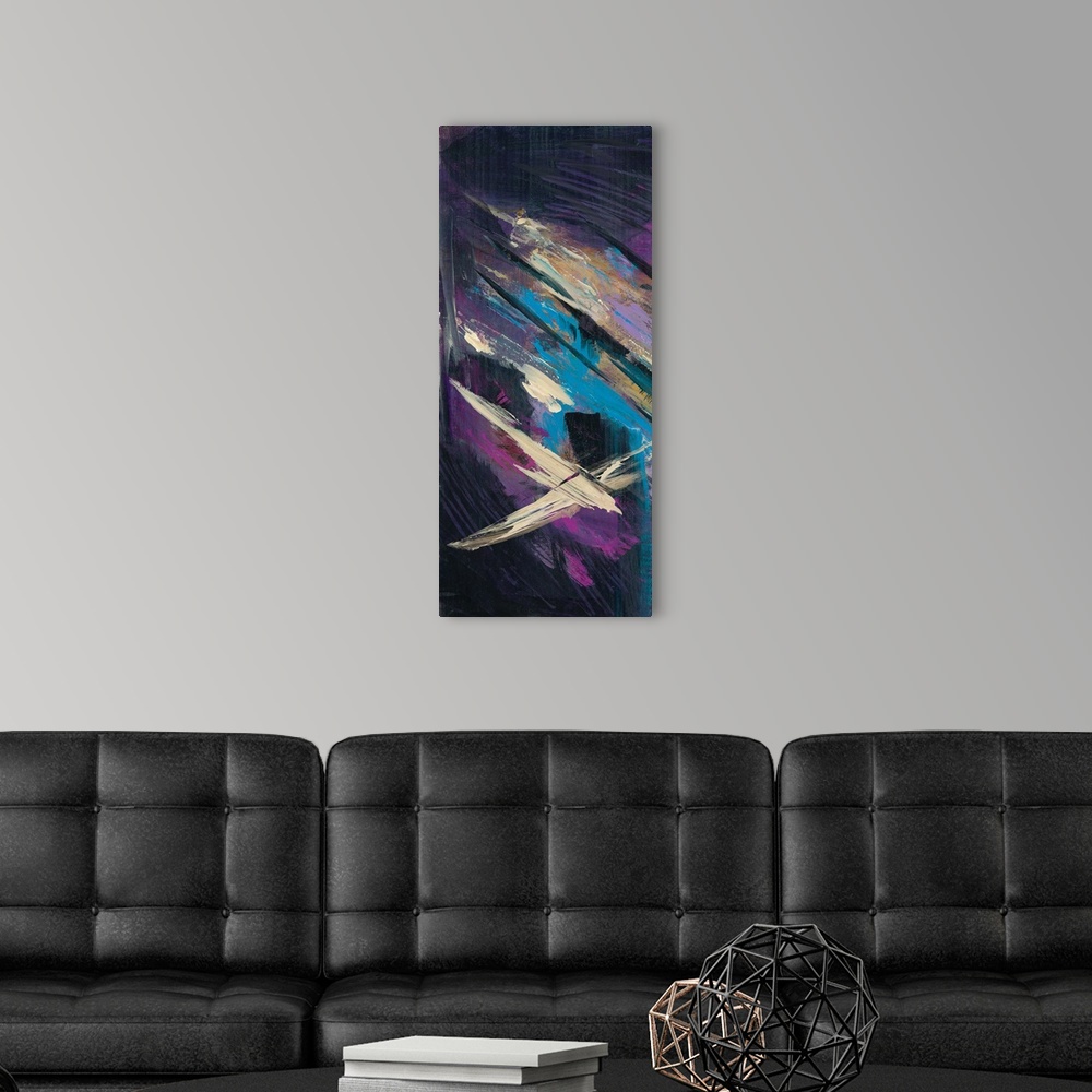 A modern room featuring Panel abstract painting with a dark black background and bright purple, pink, blue, and tan brush...