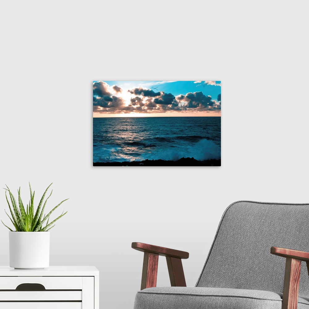 A modern room featuring Depoe Bay Sunset I