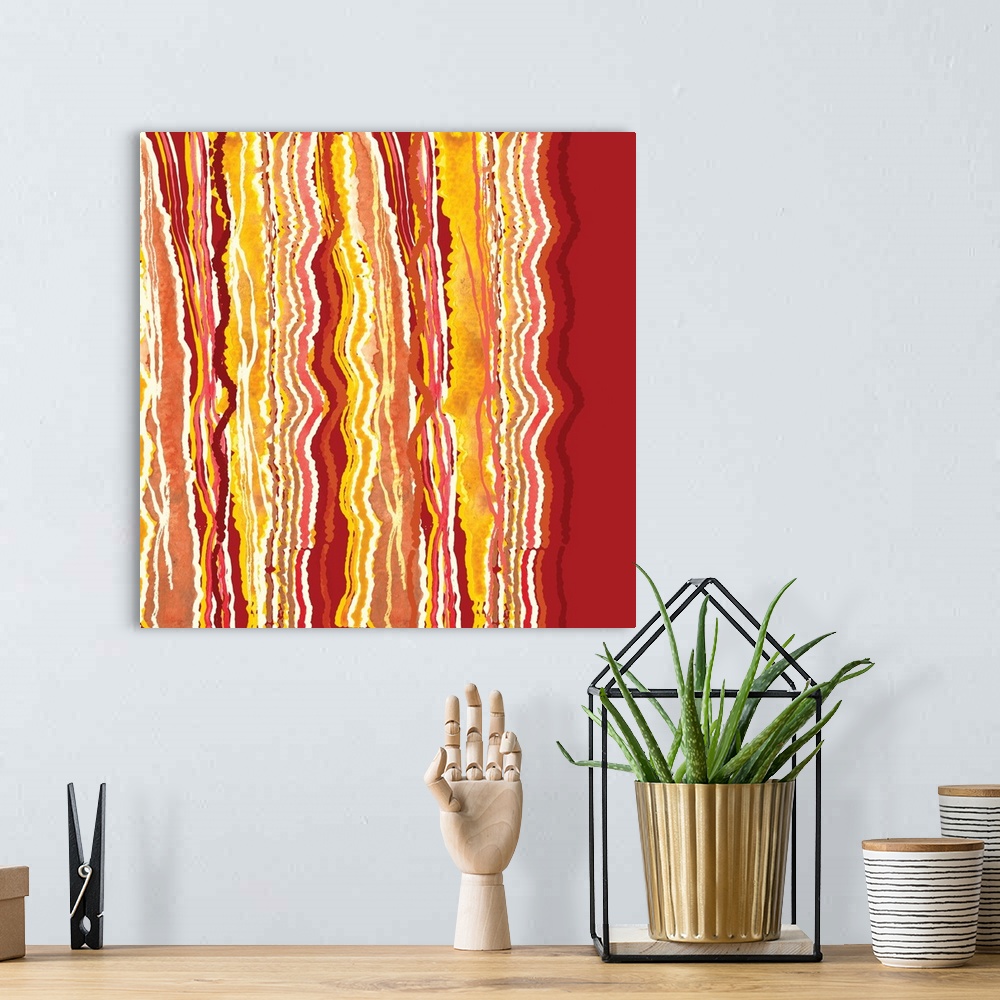 A bohemian room featuring Square abstract painting with squiggly lines running vertically in shades or red, pink, and yellow.