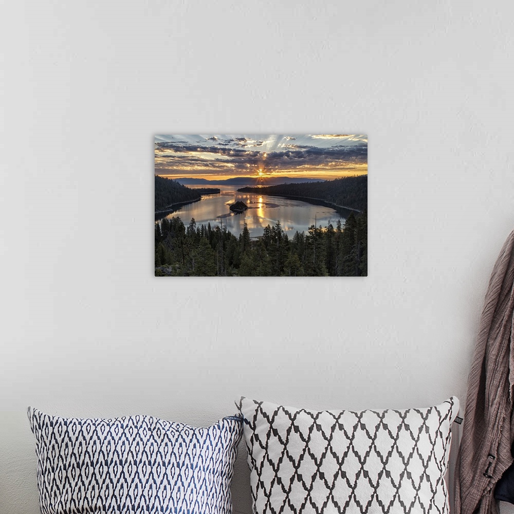A bohemian room featuring Landscape photograph of a beautiful sunset beaming through the clouds over Emerald Bay in Califor...