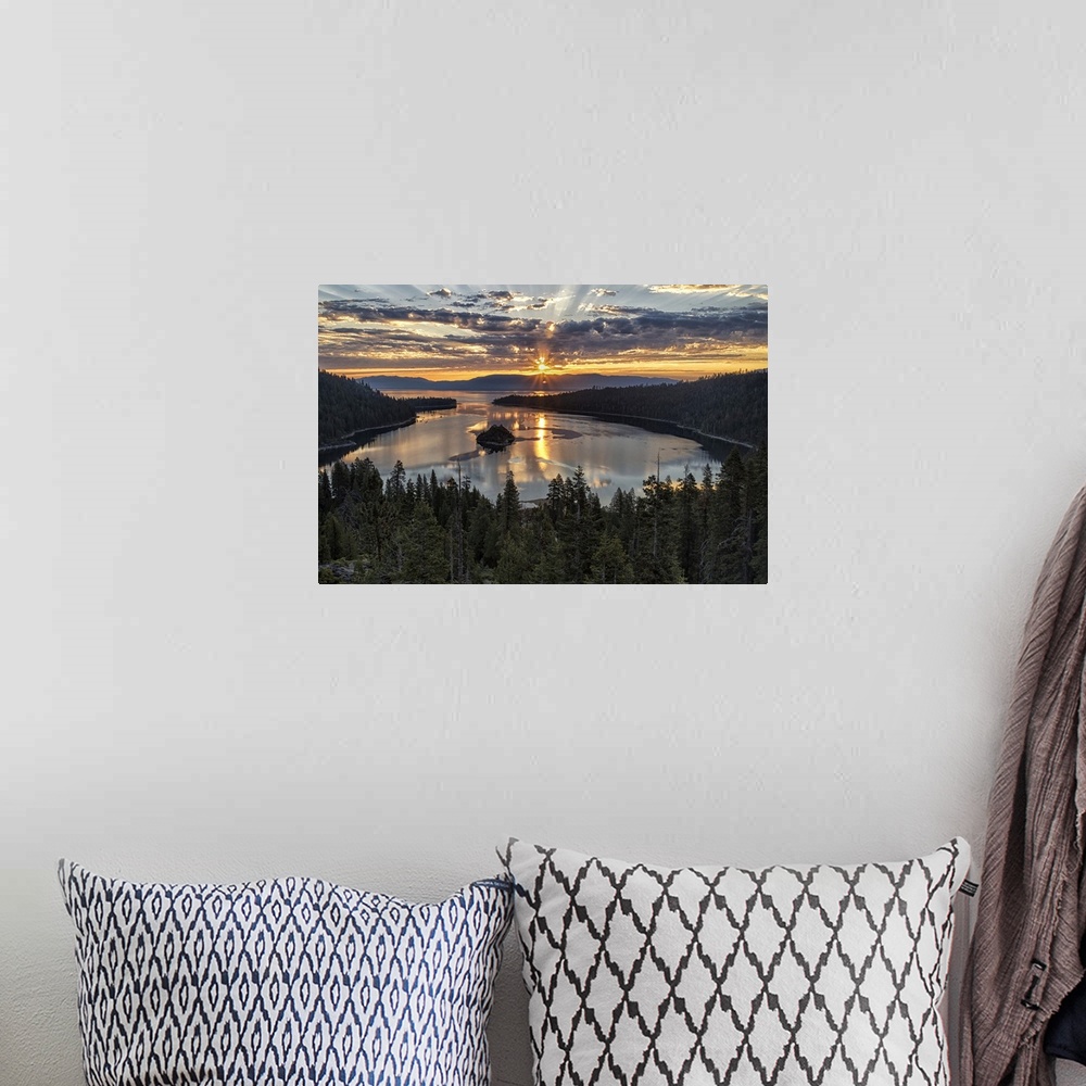 A bohemian room featuring Landscape photograph of a beautiful sunset beaming through the clouds over Emerald Bay in Califor...