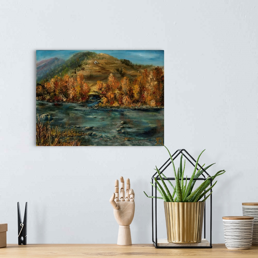 A bohemian room featuring Contemporary painting of a rocky river flowing in front of Autumn colored mountains.