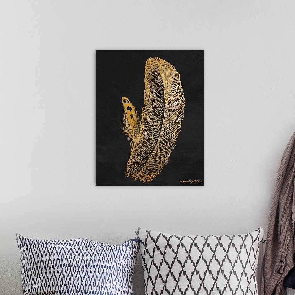 A bohemian room featuring An illustration of a feather in gold over a black background.