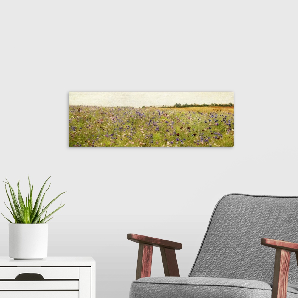 A modern room featuring Giant, panoramic painting of a vast field of wildflowers and tall grasses, beneath a clear sky.