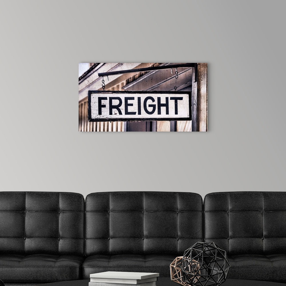 A modern room featuring Close up photo of detail and lettering from a vintage train car.