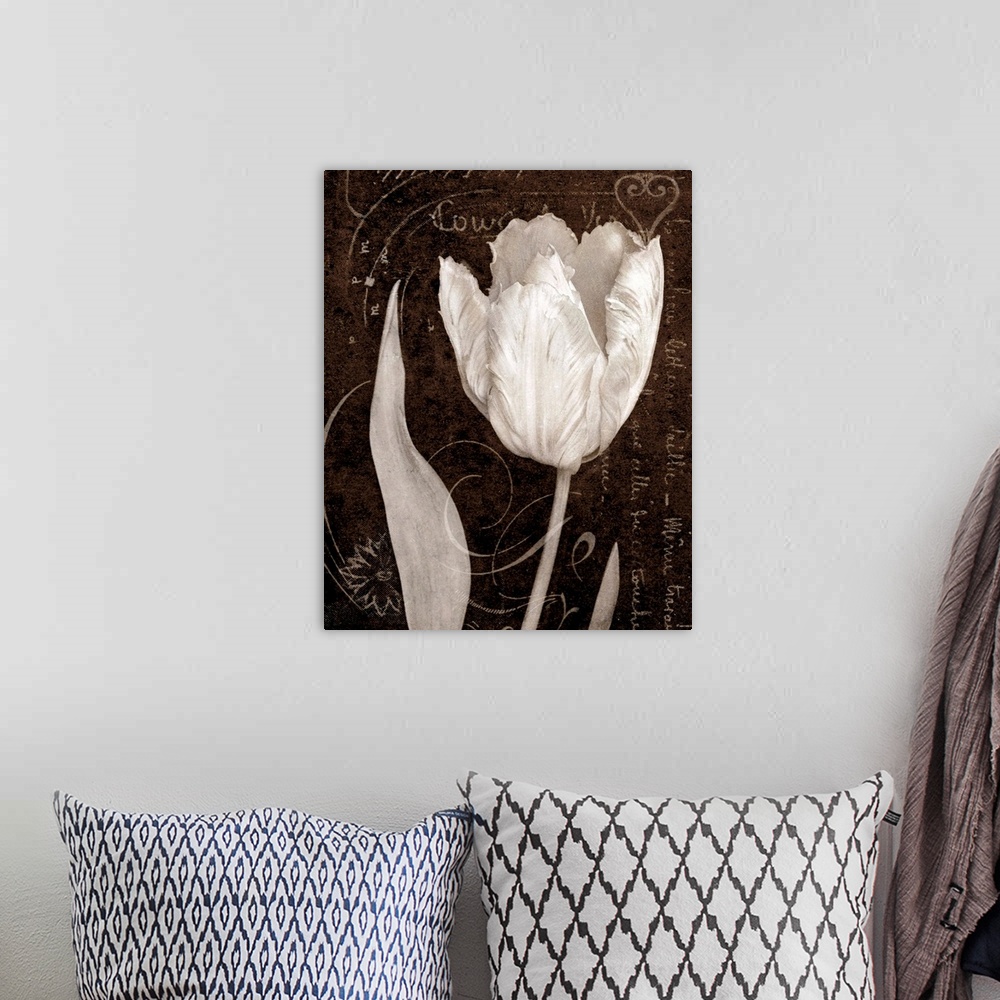 A bohemian room featuring Giant monochromatic floral art accents a single tulip flower sitting in front of a slightly textu...