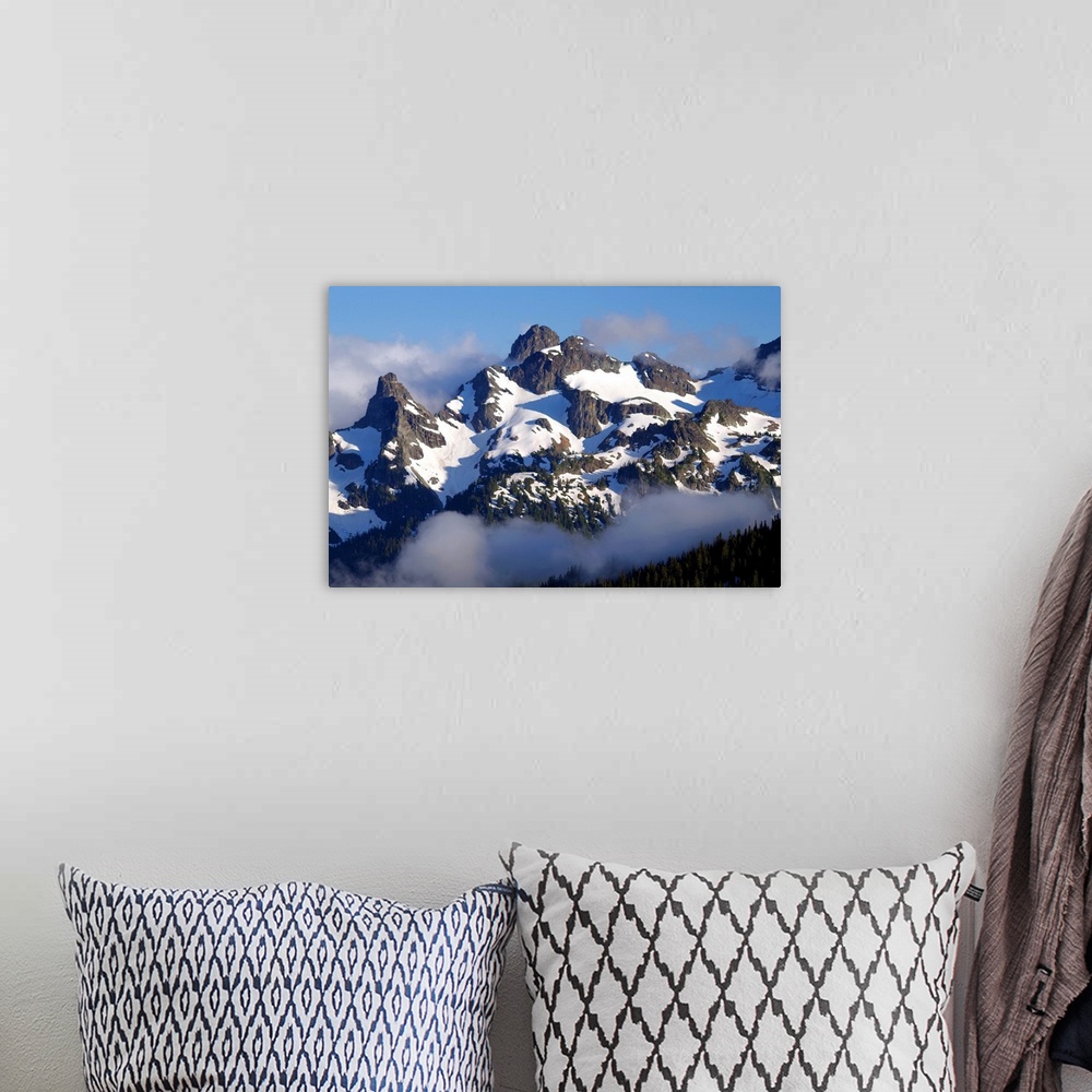 A bohemian room featuring Landscape photograph of a fog covered  Goat Island Mountain in Washington.