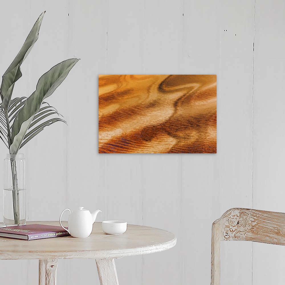A farmhouse room featuring An abstract photograph created by natural reflections in rippling water.