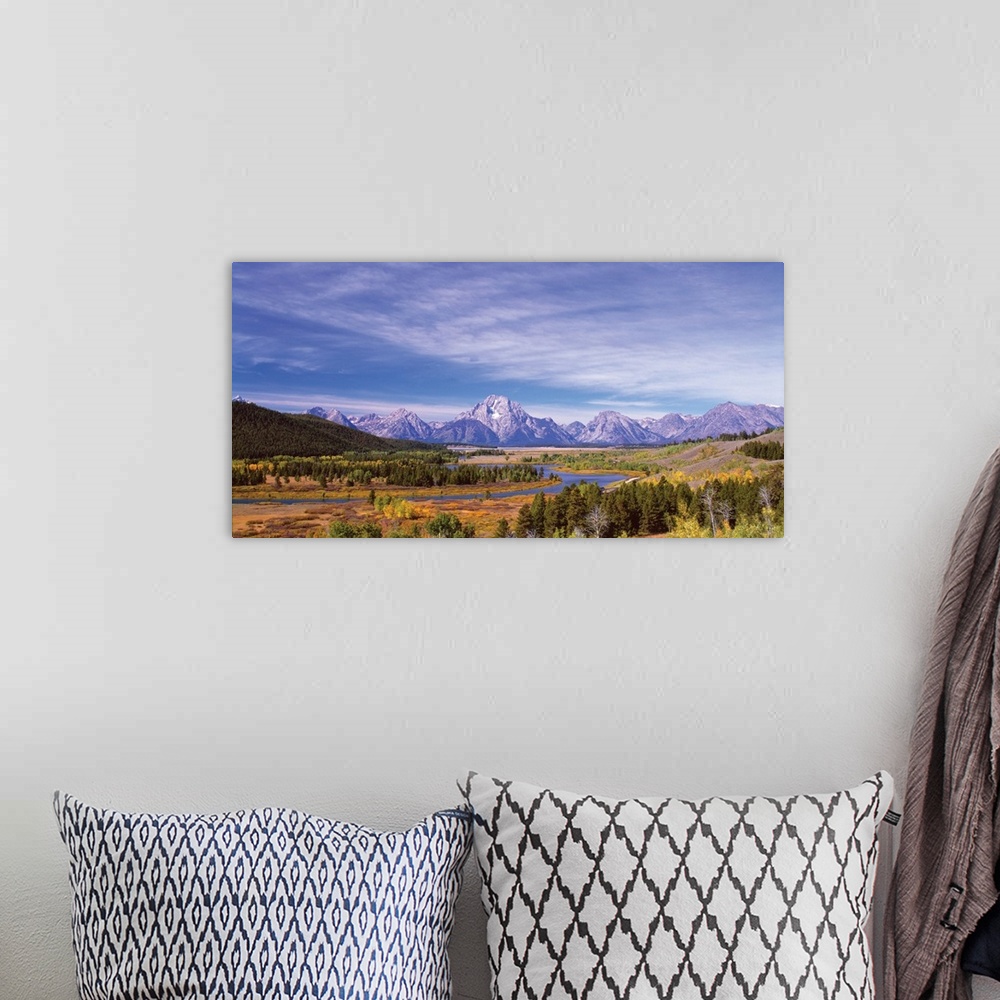A bohemian room featuring View of the Grand Teton mountain range in the Wyoming wilderness.
