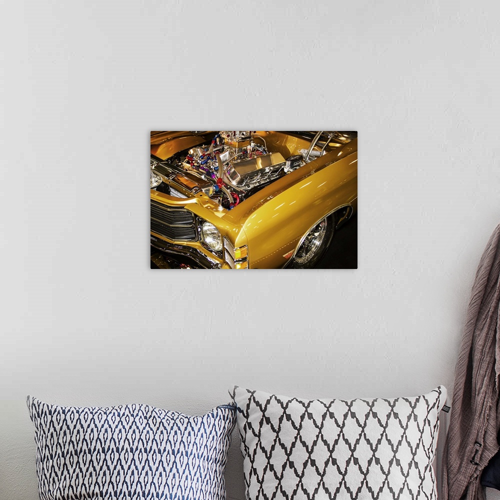 A bohemian room featuring Fine art photograph of a vintage car. The hood is popped and the engine is visible.