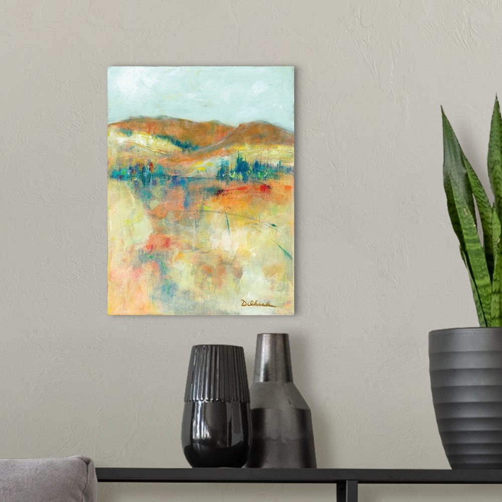 A modern room featuring Colorful abstract painting of a hilly landscape.