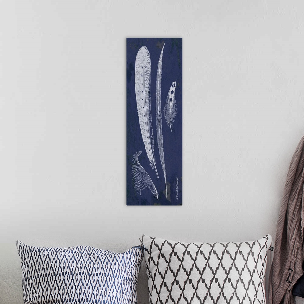 A bohemian room featuring Tall indigo panel with white silhouetted feathers.