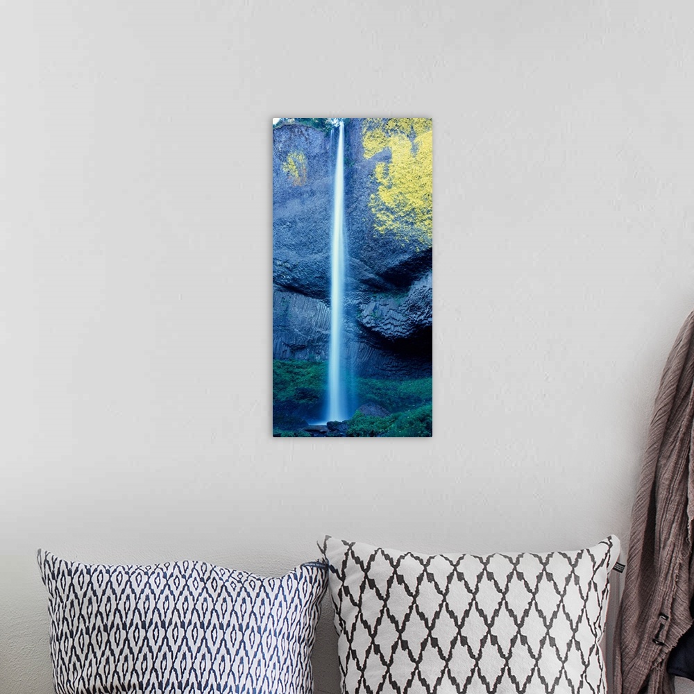 A bohemian room featuring Tall photograph of Latourell Falls in Oregon.