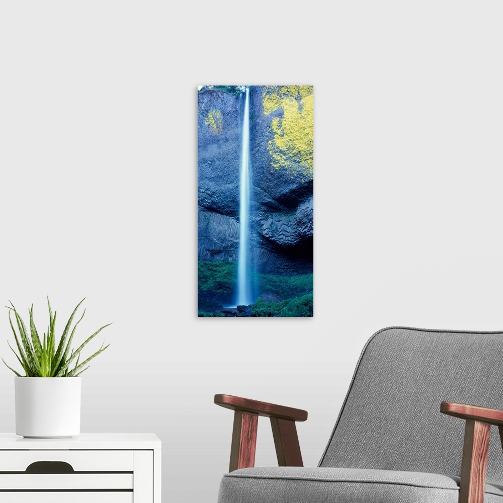 A modern room featuring Tall photograph of Latourell Falls in Oregon.