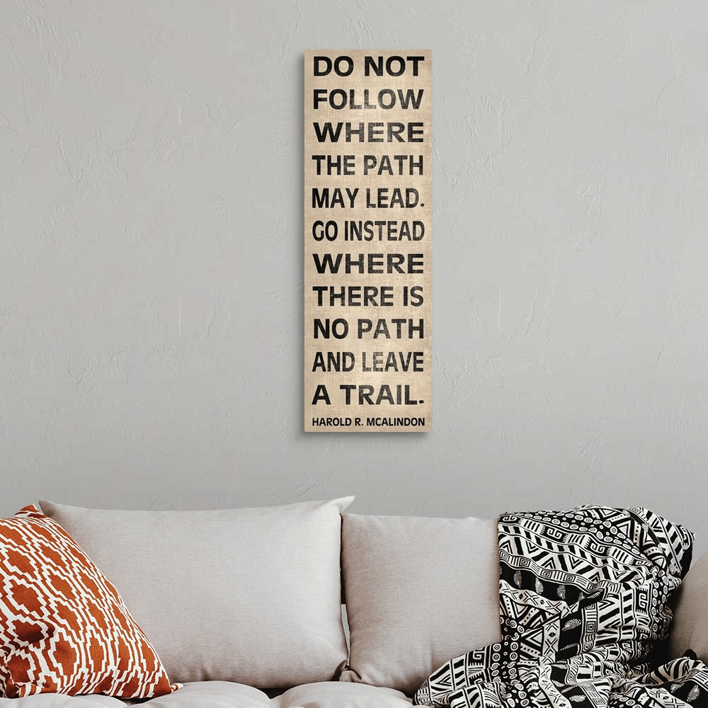 A bohemian room featuring Vertical bus roll style print of a quote by Harold R. Mcalindon about creating your own path in l...