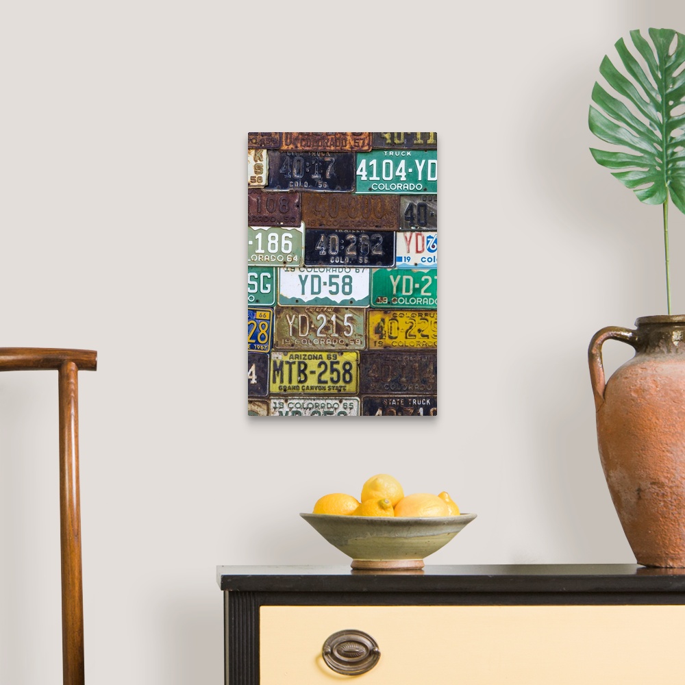 A traditional room featuring A collection of vintage license plates.