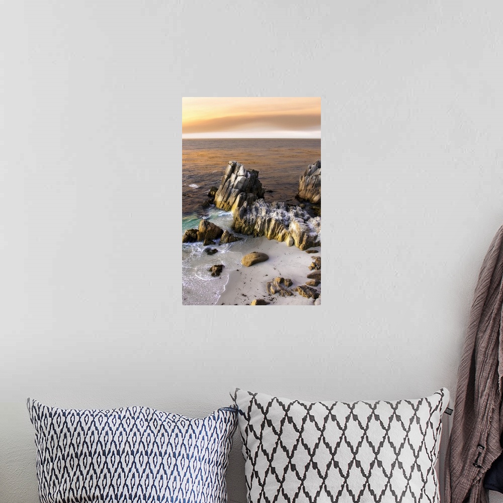 A bohemian room featuring Vertical photo on canvas of tall rocks sticking out of the ocean by the shoreline with sun set wa...