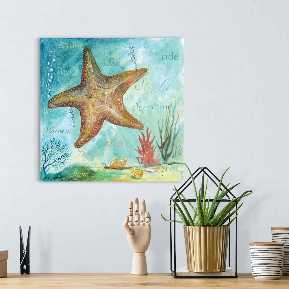 A bohemian room featuring Square painting of a starfish surrounded by marine life and words.