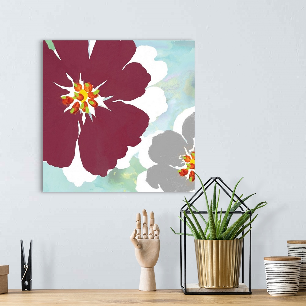 A bohemian room featuring Square painting of a large marsala colored flower and a smaller grey flower with white shadows on...