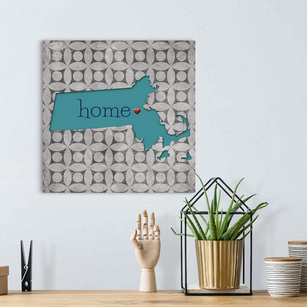 A bohemian room featuring Square decor with a blue outline of the state of Massachusetts with "home" written in the center ...