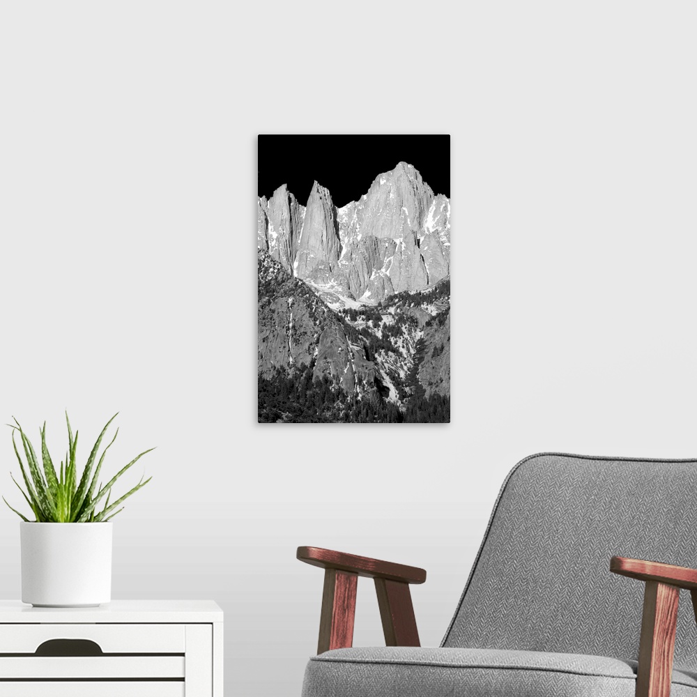 A modern room featuring Black and white landscape photograph of Mount Whitney highlighting its rocky textures.