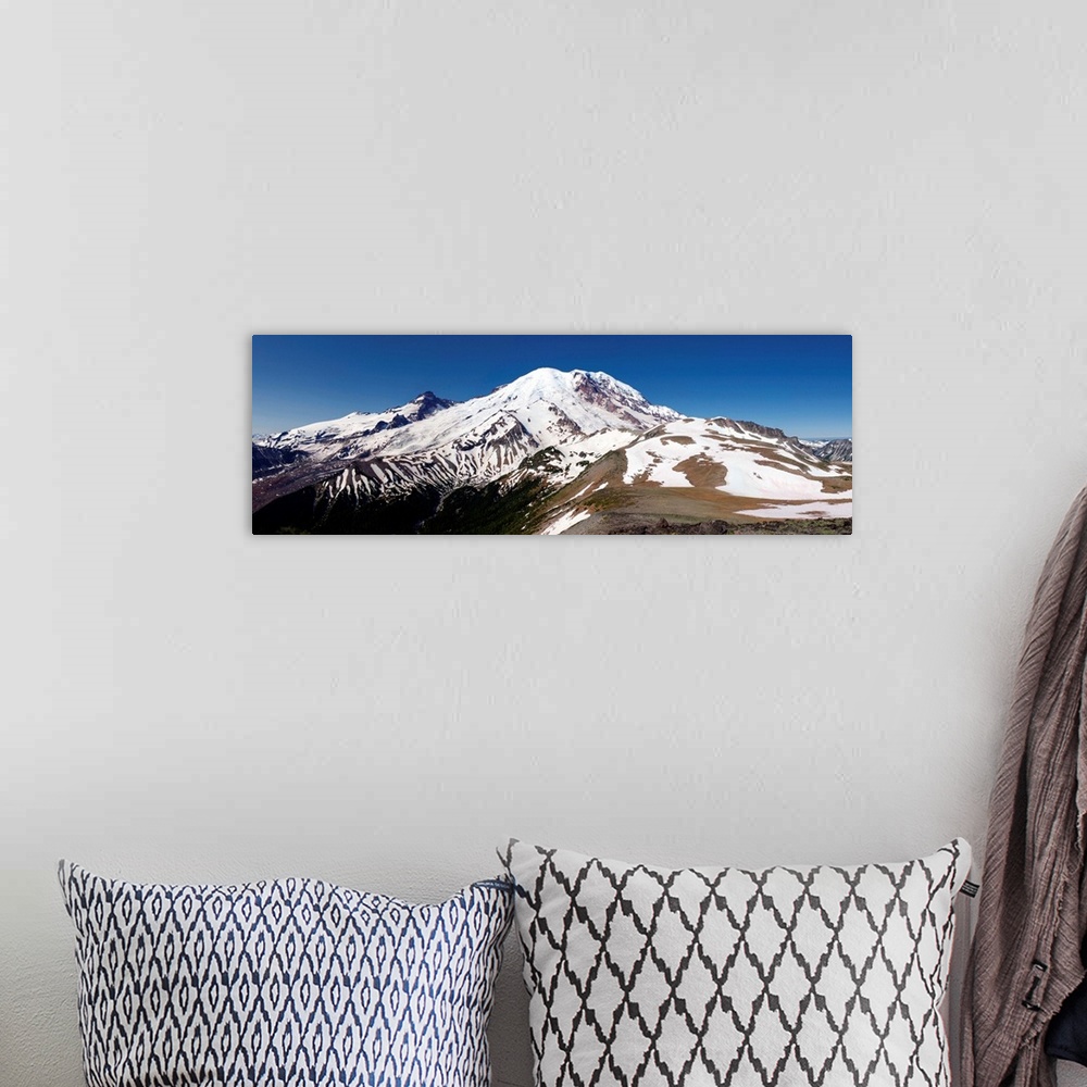 A bohemian room featuring Panoramic view of the snowy peak of Mount Rainier.