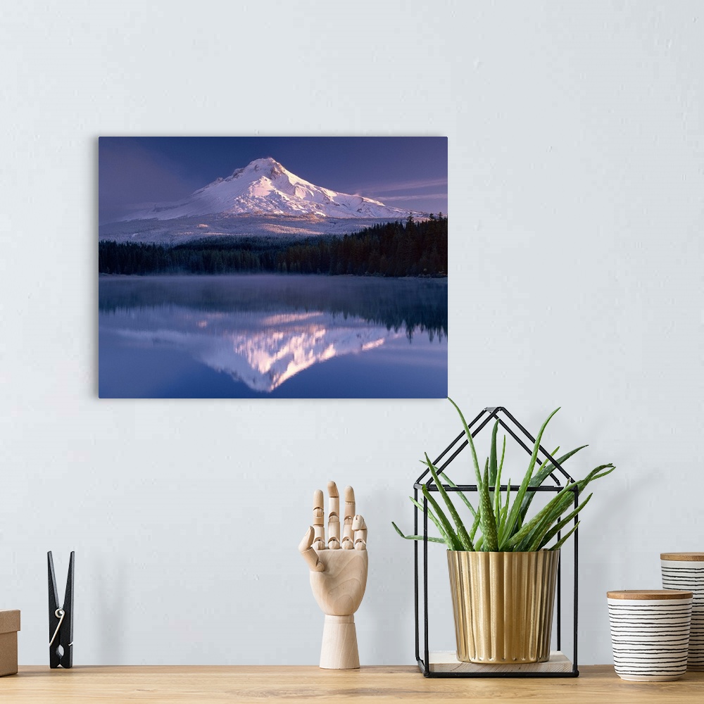 A bohemian room featuring Snowy Mount Hood reflected in the lake below, Oregon.