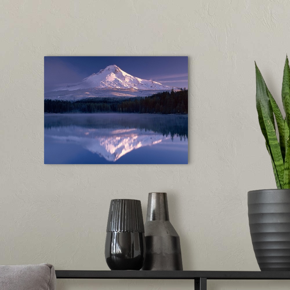 A modern room featuring Snowy Mount Hood reflected in the lake below, Oregon.