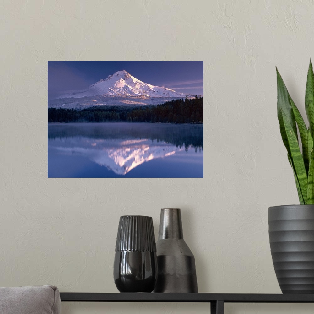 A modern room featuring Snowy Mount Hood reflected in the lake below, Oregon.
