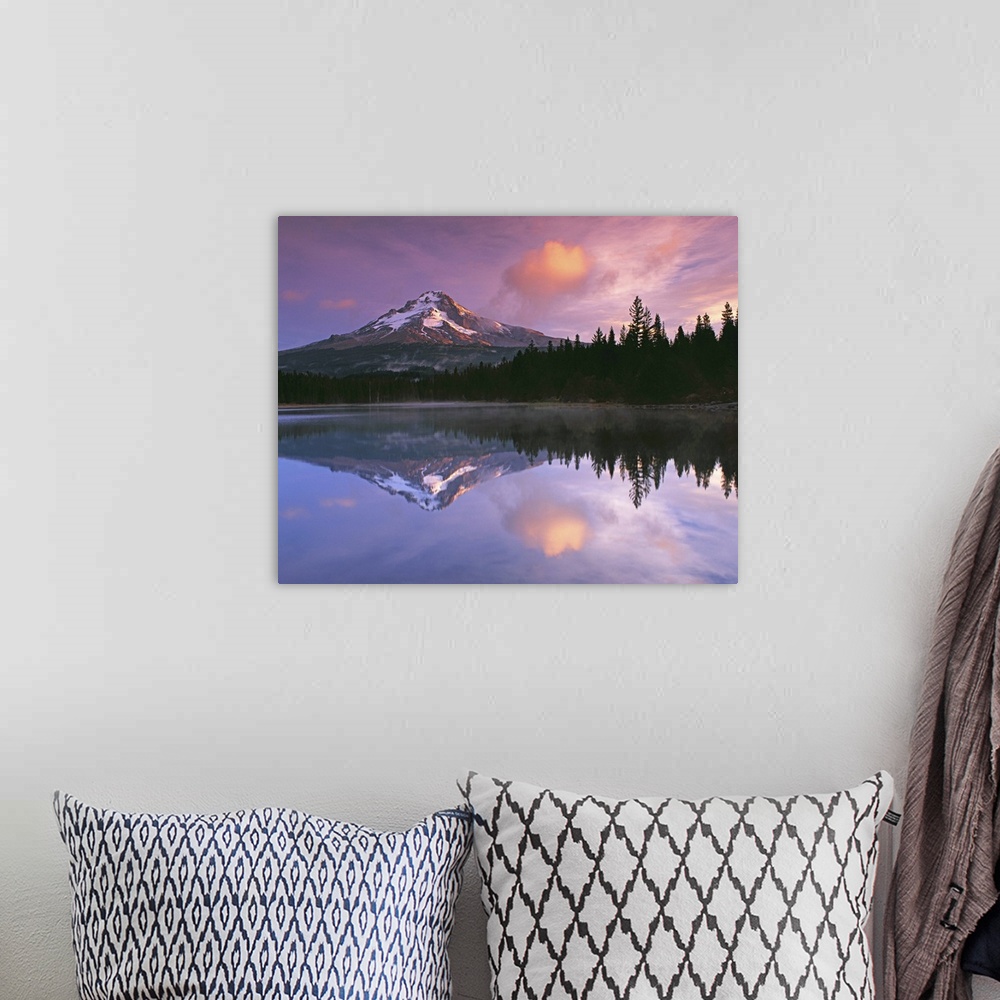 A bohemian room featuring Mount Hood and the surrounding forests reflected in a lake, Oregon.