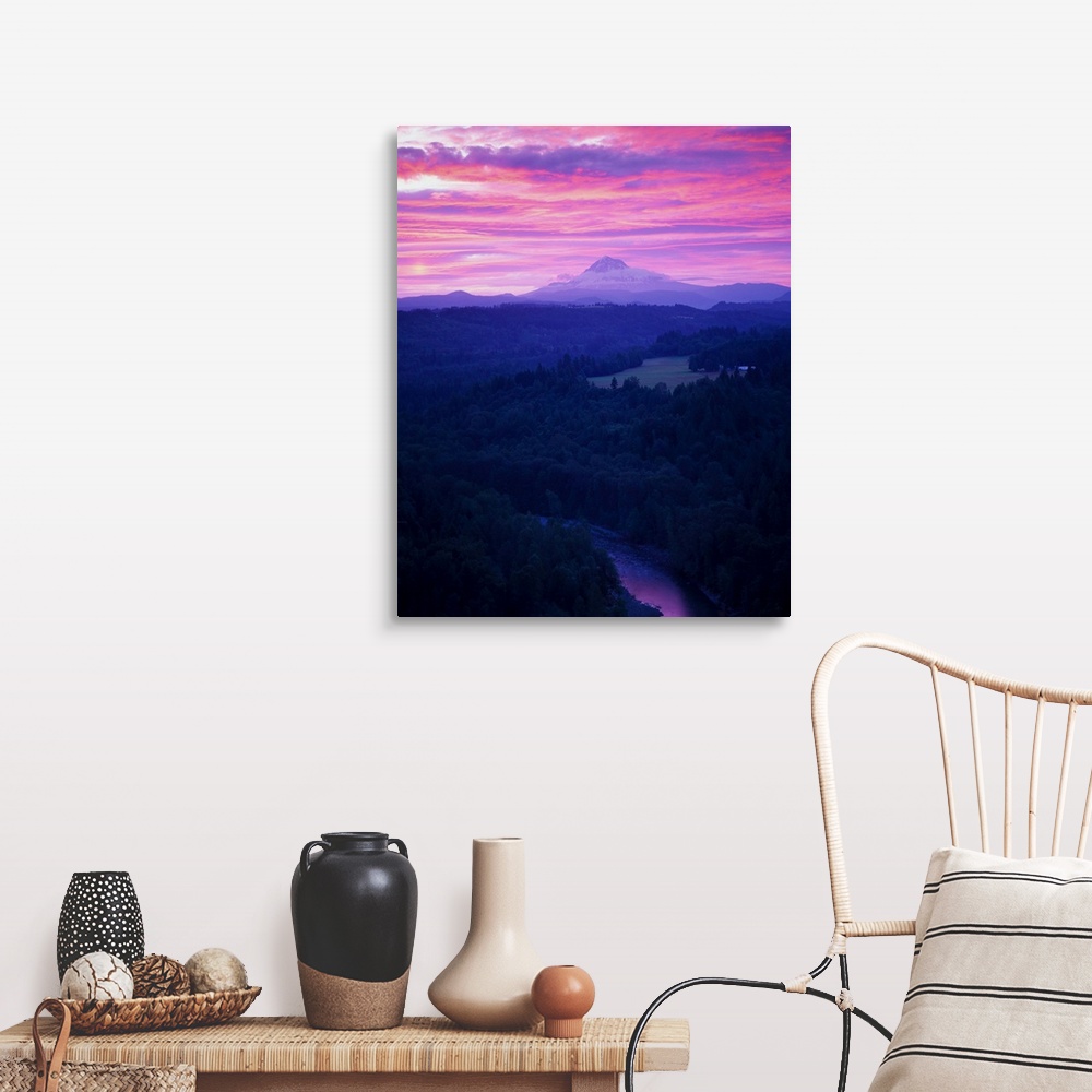 A farmhouse room featuring Purple clouds at sunset over Mount Hood covered in fog in the distance.