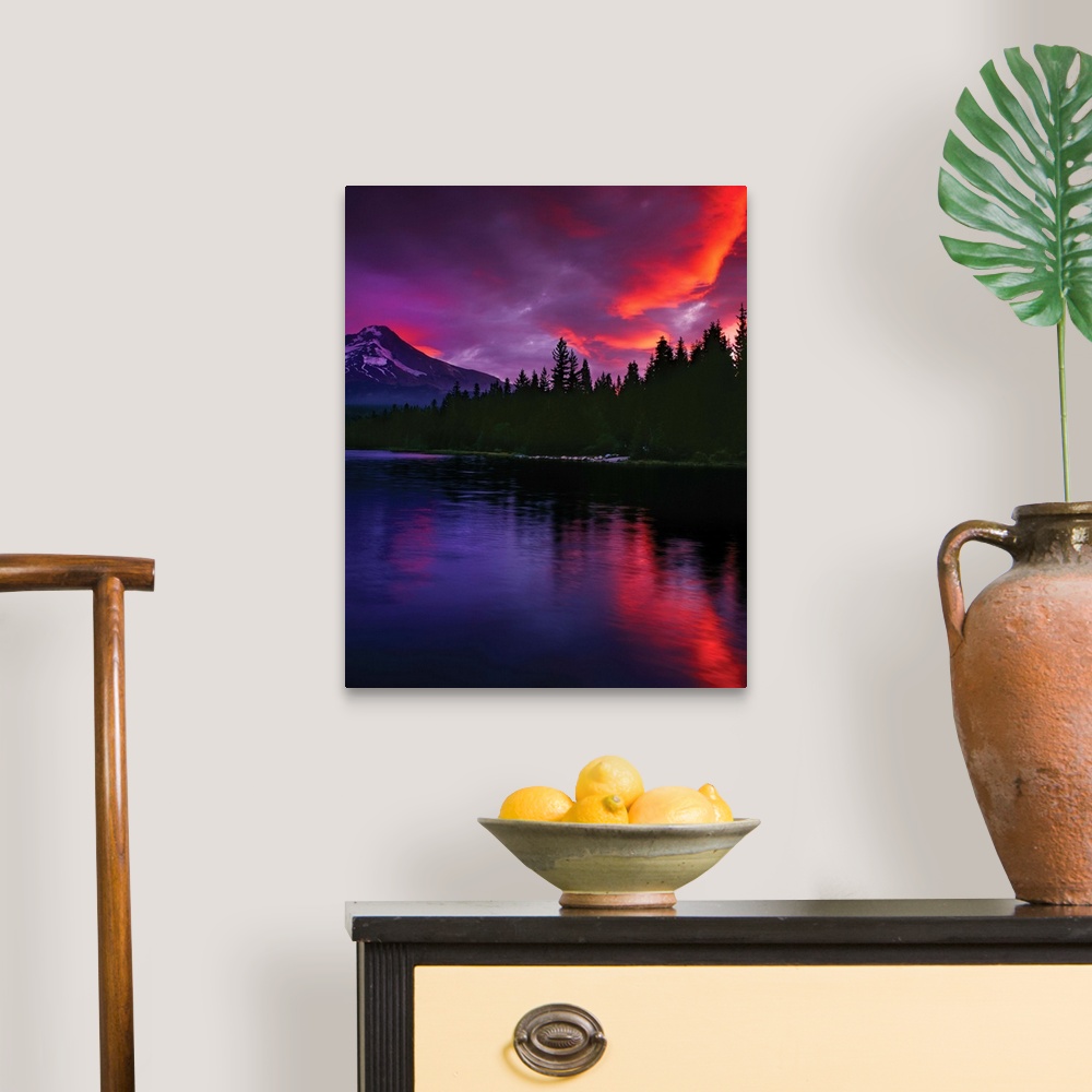 A traditional room featuring Fiery sunset illuminating the clouds above Mount Hood.