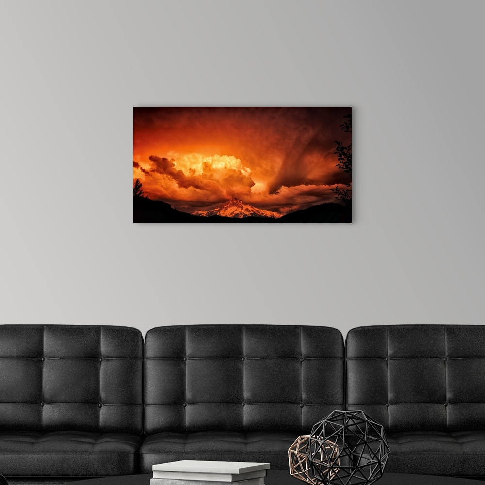 A modern room featuring Intense sunset colors in the clouds over Mount Hood.
