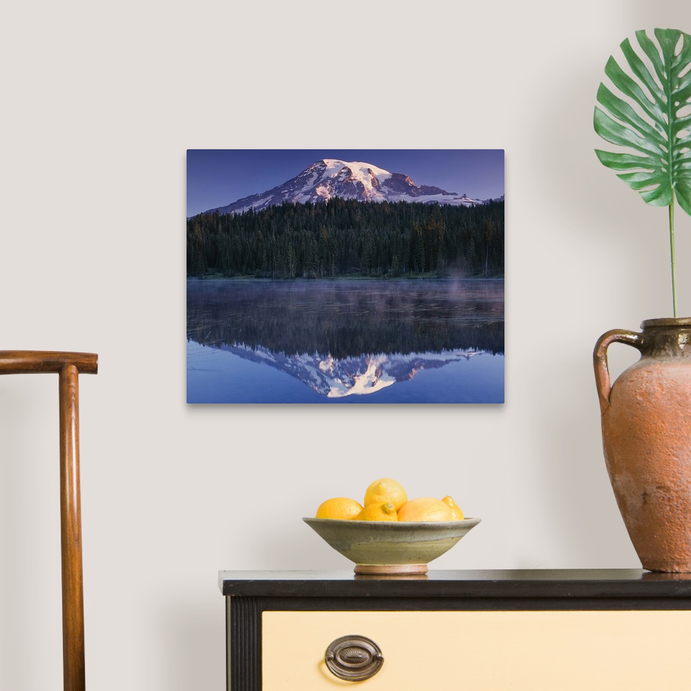 A traditional room featuring Mount Rainier and the surrounding forests reflected in a lake, Washington.