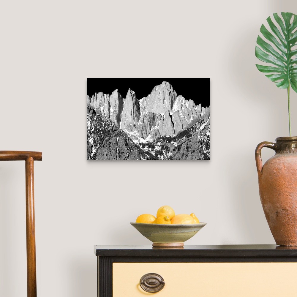 A traditional room featuring Black and white photograph of Mount Whitney.