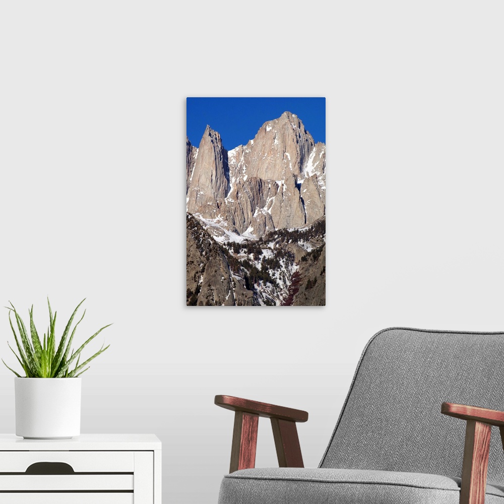 A modern room featuring Photograph of Mount Whitney's sharp and rocky peaks.