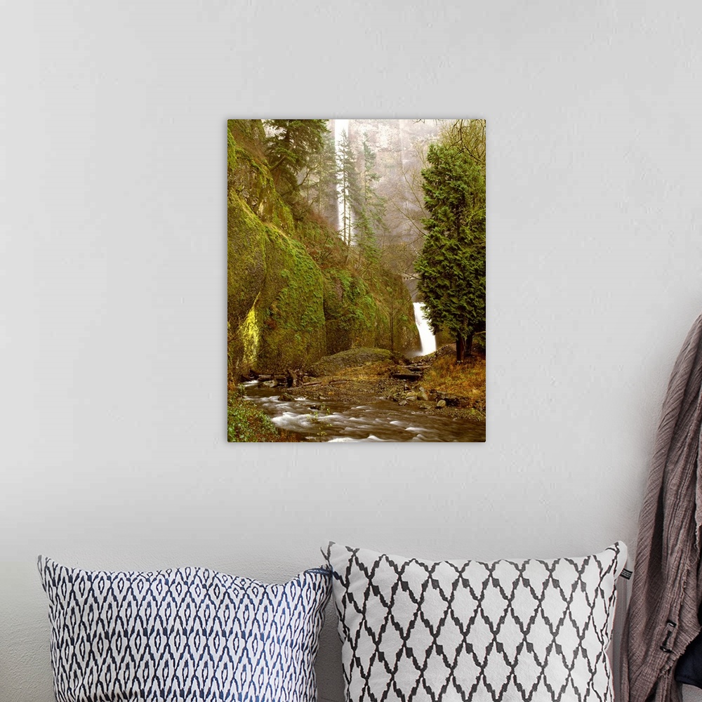 A bohemian room featuring Landscape photograph with Multnomah Falls in the background and a rushing creek in the forground,...