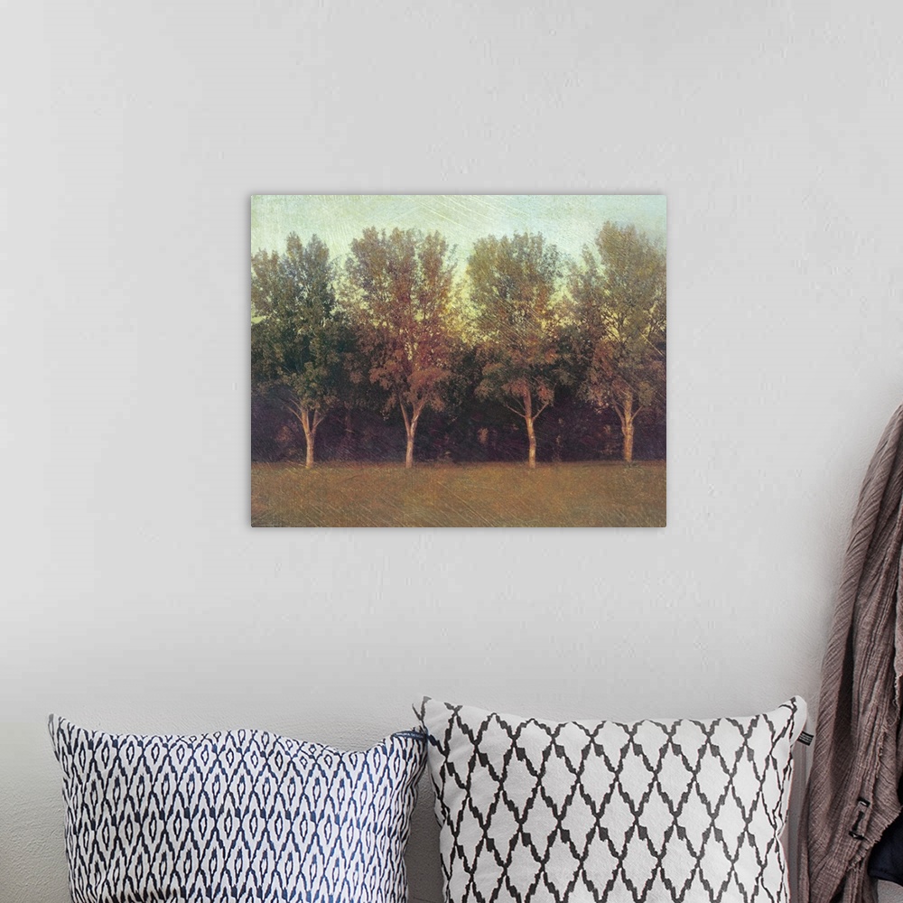 A bohemian room featuring Big painting on canvas of trees in a row with a forest behind them.