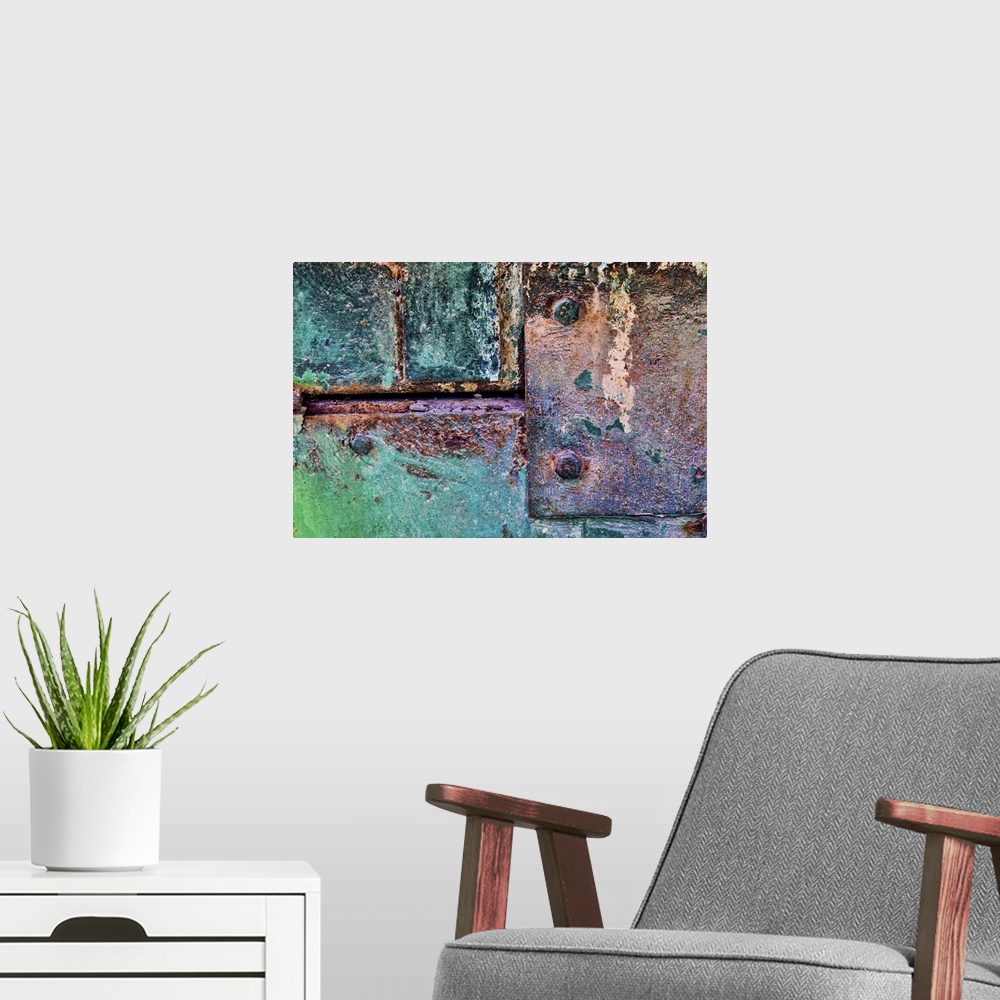 A modern room featuring A close up photo of weathered metal elements, creating an abstract image.