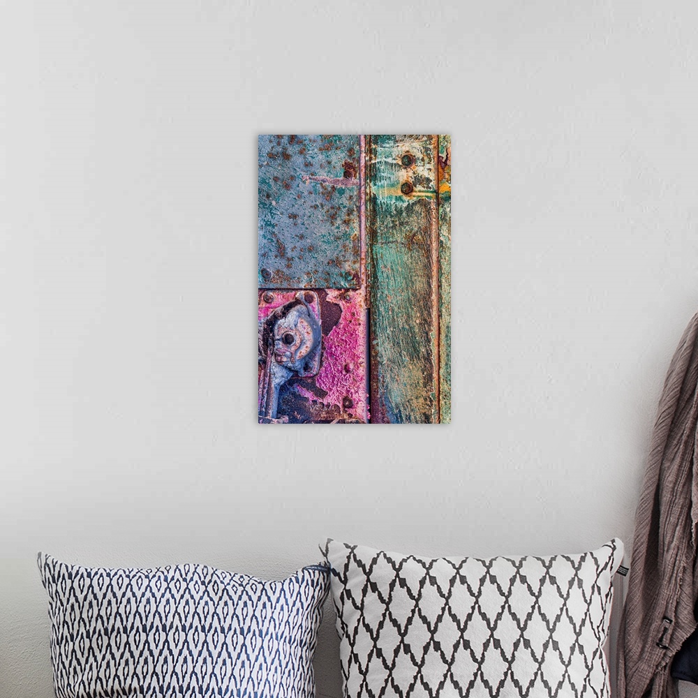 A bohemian room featuring A close up photo of weathered metal elements, creating an abstract image.